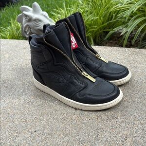 Black Nike Air Jordan Retro High-Top Sneakers with Gold Zipper